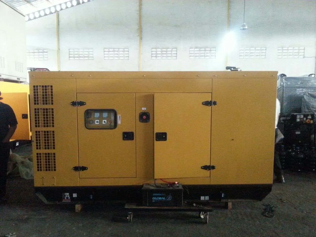 Unit Genset Perkins Silent Type warna kuning dengan Panel Kontrol Digital