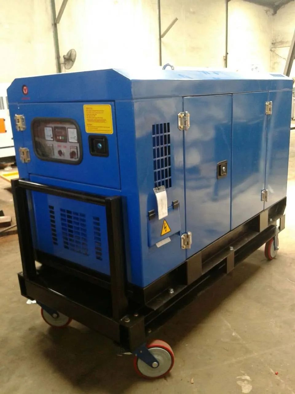 Genset Deutz portable silent type warna biru dengan roda troli dan panel meter analog